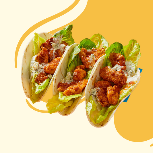 Popcorn Chicken Tacos with Avocado and Lime Crema